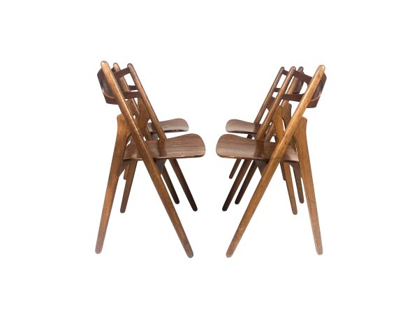 Hans J. Wegner, set of four 'Sawbuck' CH29 chairs, teak and oak, Denmark 1950s