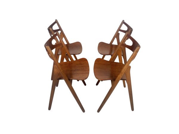 Hans J. Wegner, set of four 'Sawbuck' CH29 chairs, teak and oak, Denmark 1950s