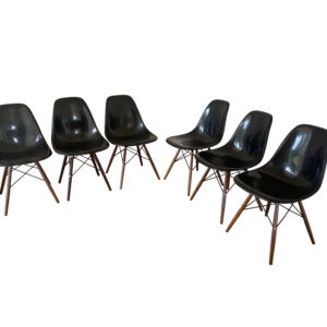 Charles Eames DSW dining chairs in black glasfiber by Herman Miller