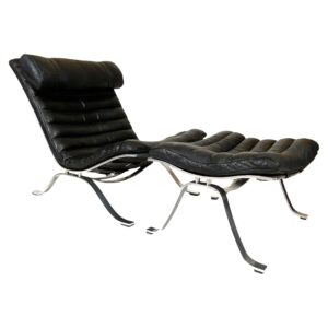 Arne Norell Ari lounge chair and ottoman in black leather Sweden 1966.